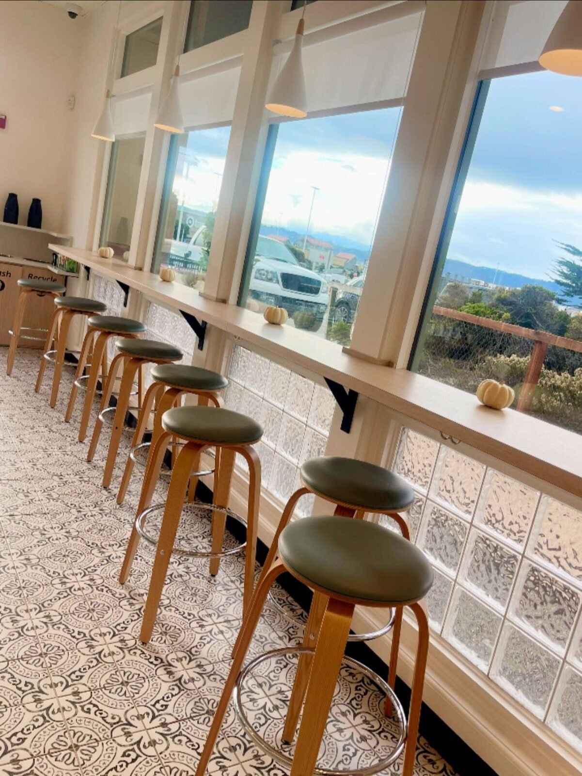 Rosine's bright dining room with coastal windows